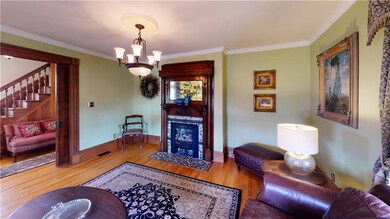 Living Room with Stained Glass and Original Wood D