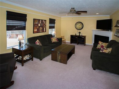 Large family room with fireplace and flooded with 