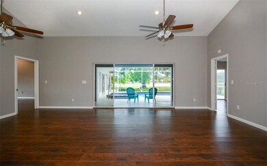 View of the large great room and pocked sliders fr