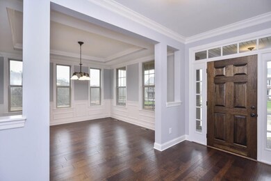 Dining Room from Foyer.  Photos are from a different Community Model but Similar Floor-plan.