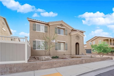 Mediterranean / spanish-style house featuring a ti