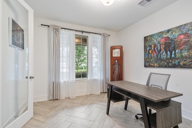 Bright home office with large window, glass door,