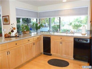 Remodeled kitchen overlooks golf course
