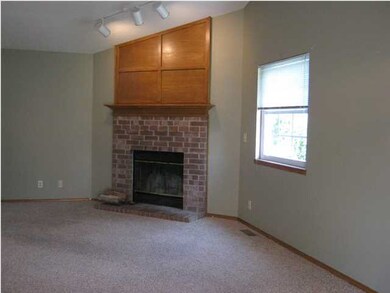 Open living-dining room with vaulted ceiling