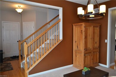 Carpeted formal dining room.
