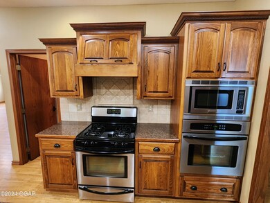 305 E Maple St, Liberal, MO 64762 - photo 5