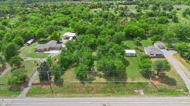 Bird's eye view with a wooded view