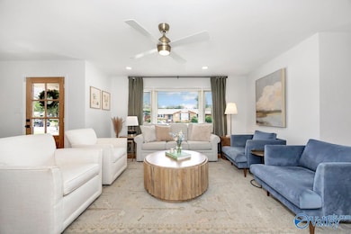 This room is the hub of this adorable one level brick rancher in Thornton Acres!