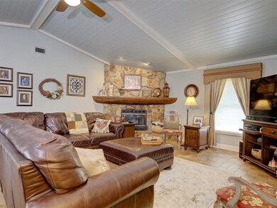 GREAT ROOM WITH VAULTED CEILINGS AND FIREPLACE