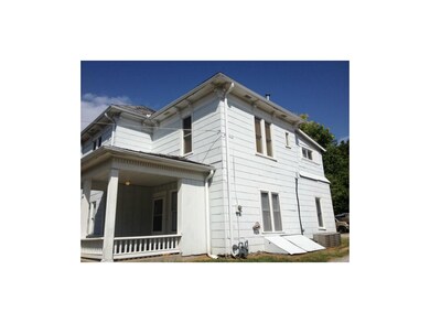 Side view and basement entrance.