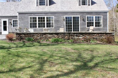 View of stone patio and perennial garden