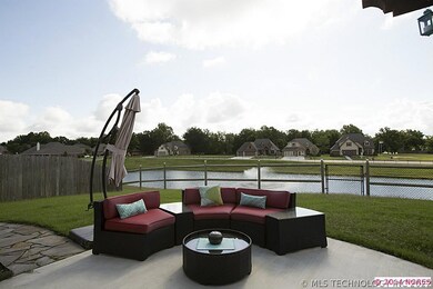 Extended oversize patio with views of water.