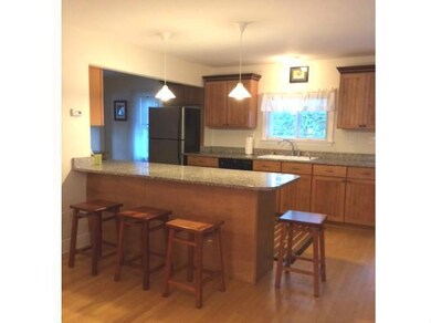 Kitchen. Maple cabinetry with...
