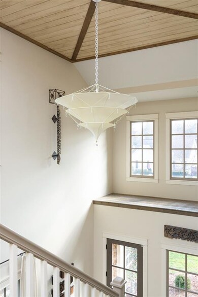 Check out this wood ceiling treatment in the foyer!