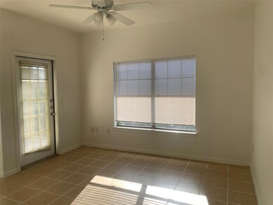 Tiled empty room with healthy amount of natural l
