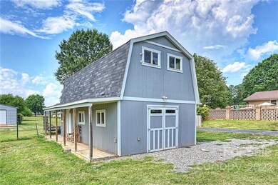 Exterior Woodshop with 220V & 110V outlets throughout