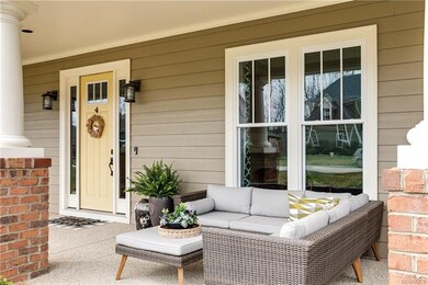 View of the front porch with TONS of entertaining 