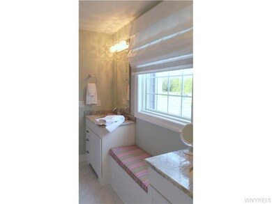 Bathroom. This generous size bathroom serves two b