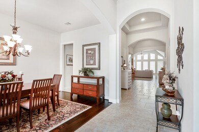 As you walk in, to the left is the formal dining room, right hall for 2 guest bedrooms that share a nice guest bathroom.