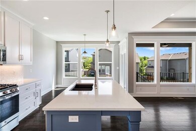 1304 SW Sapperton Rd, Raymore, MO 64083 - photo 2