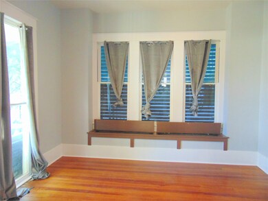 First bedroom has storage under row of windows.