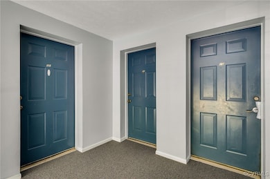 Doorway to property..middle door