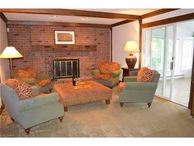 Cozy & spacious, family room boasts antique wood b