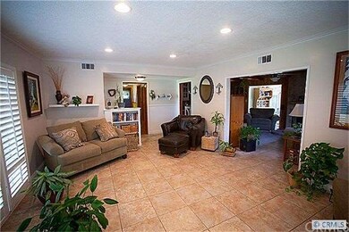 Open Floor Plan to Dining Room, Kitchen & Solarium