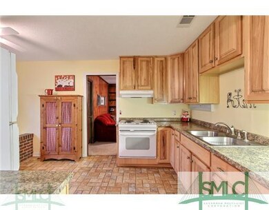 Kitchen. Updated Tall Hickory Cabinetry.