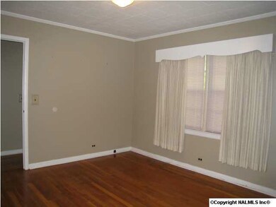 bedroom offers hardwood floors and double closets