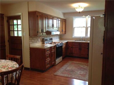 Kitchen. the other side of the kitchen.  Older but