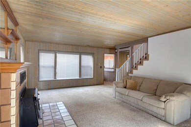 Living room, looking toward entry