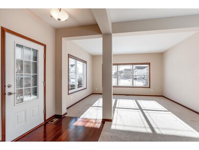 Open living and formal dining area with TONS of wi