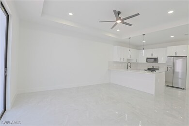 Unfurnished living room with recessed lighting, ce