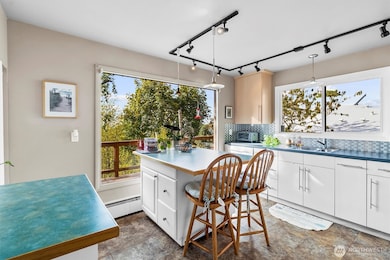 Updated kitchen with breakfast bar and modern finishes. Great for casual dining or conversation.
