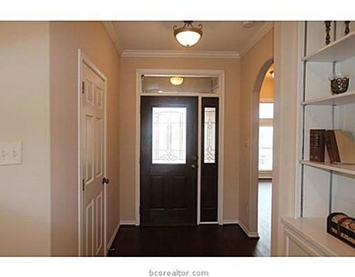 Entry/Foyer. New wood floors dress up the entry.