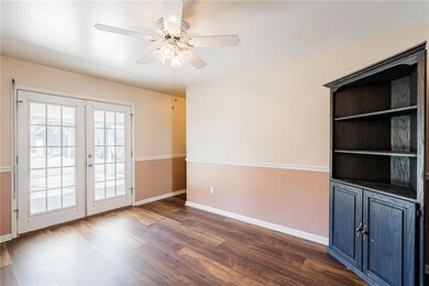 Breakfast nook looking out into the covered patio and backyard