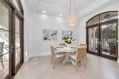 Dining room with french doors, ceiling fan with no