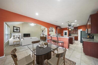This photo of the breakfast room & living room are