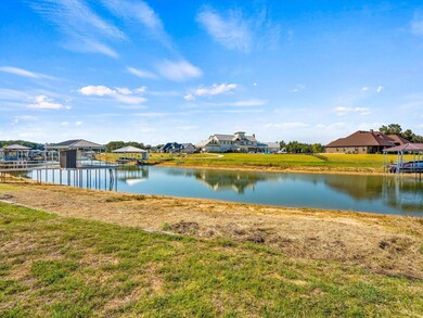 Property view of water featuring a boat dock