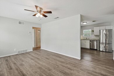 Living room and view to kitchen