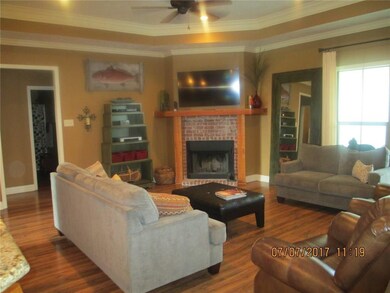 Living room, wood burning fireplace, trey ceilings