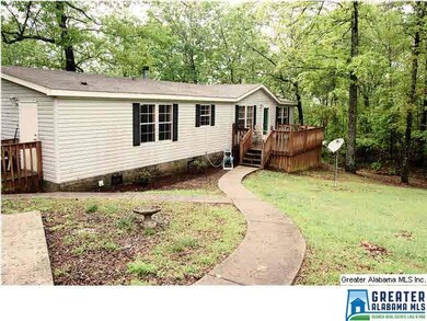 WONDERFUL PAVED DRIVEWAY AND PAVED WALKWAYS TO THE