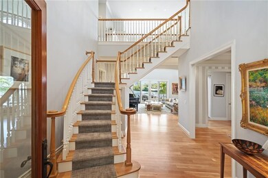 Grand oak staircase. A second staircase is positio
