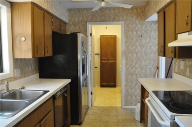 Kitchen Looking Into Laundry/Utility Room
