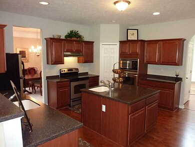 Kitchen. Large kitchen island with separate sink a