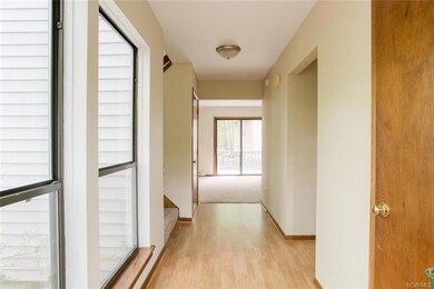 Step into the open & bright foyer with windows fro