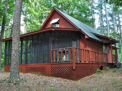 Screened Porch overlooks the woods...