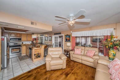 Living room looking into kitchen