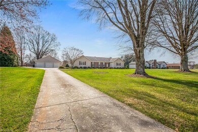 A long driveway and of space, a good distance from the road !